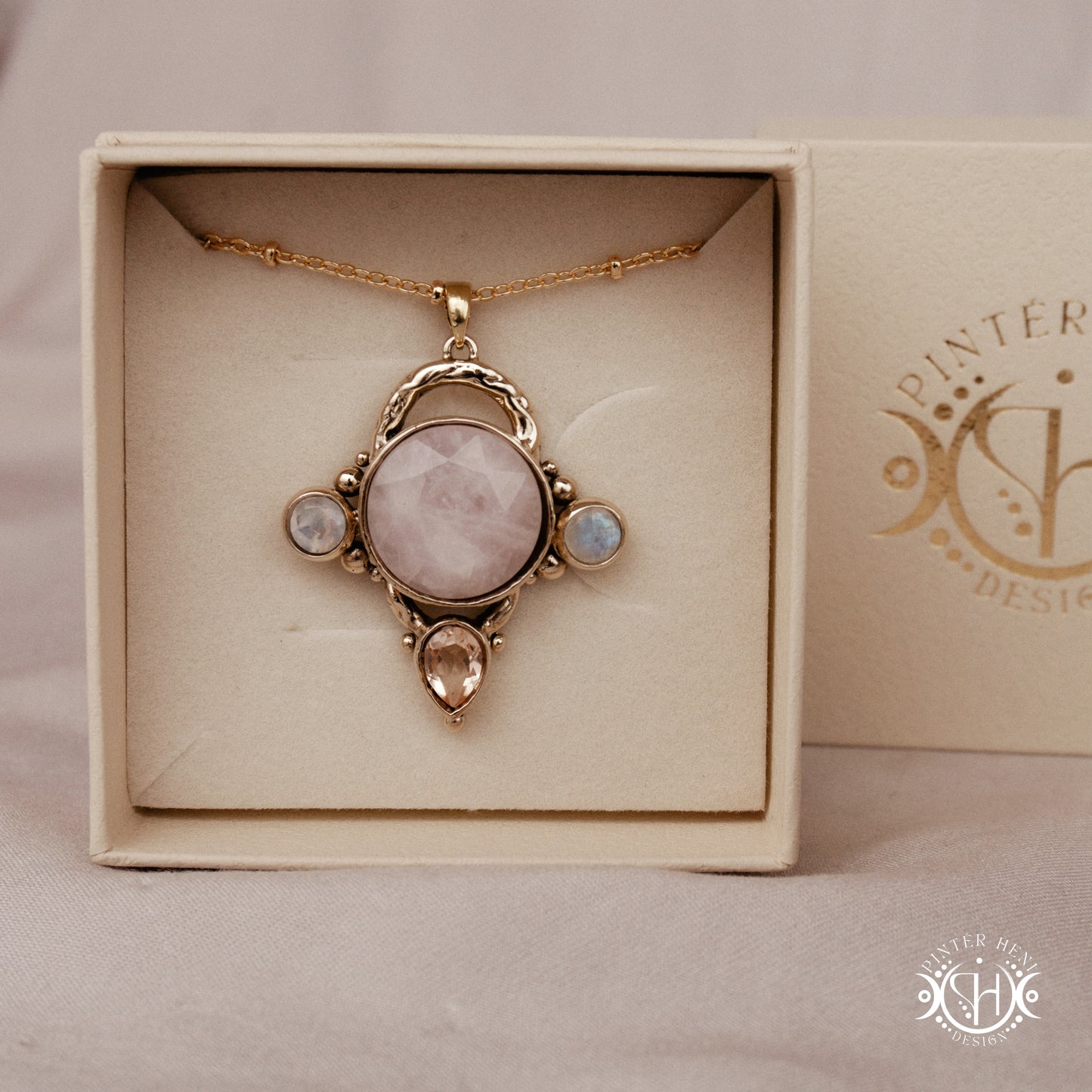 Handmade brass pendant with moonstone, morganite and rose quartz, in branded jewelry box