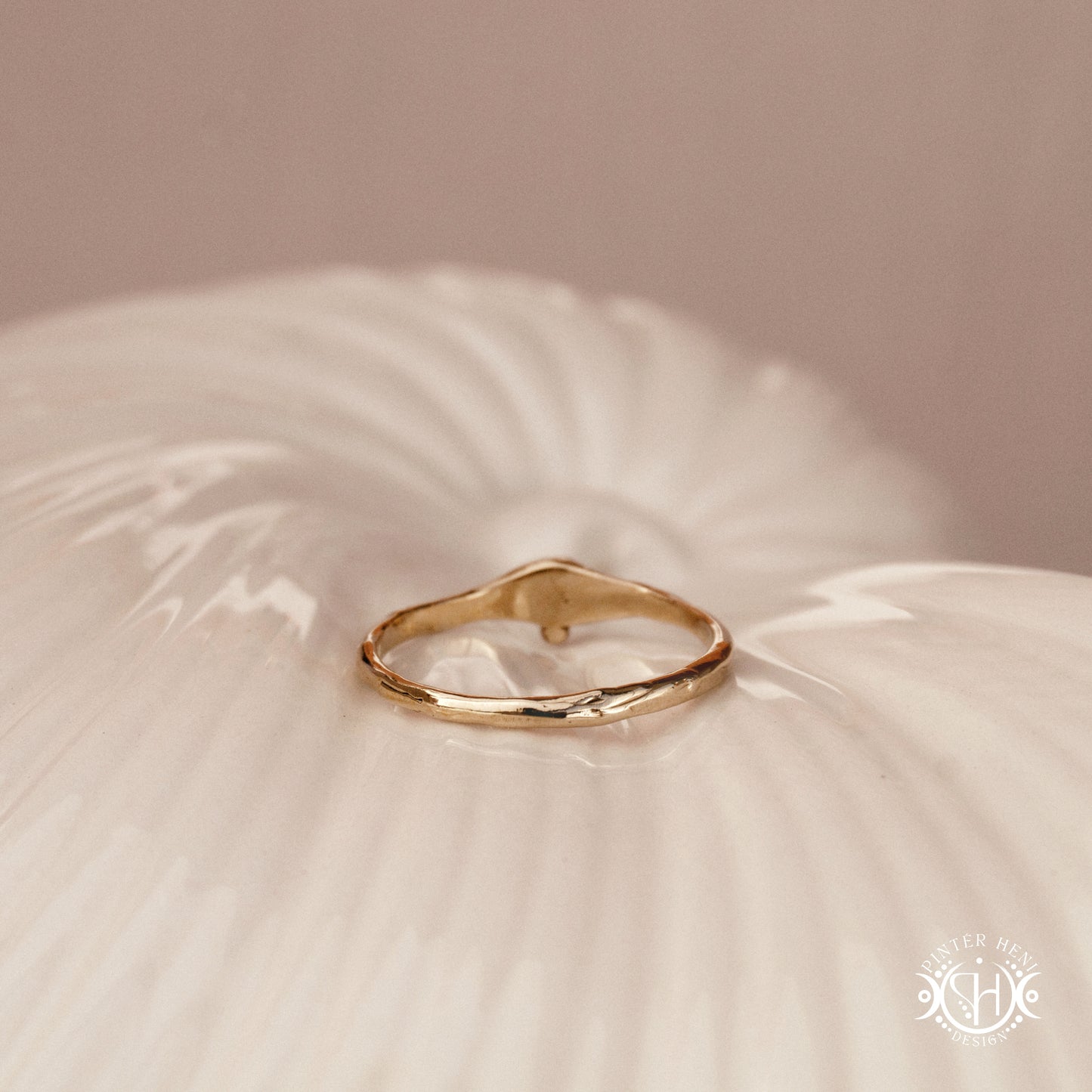 Drift Ring – a softly curved Axial Form suggesting gentle orbital movement. Handmade to order in brass, silver, or gold.