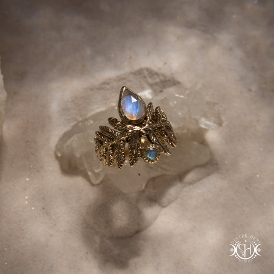 Handcrafted sculptural brass fern ring with labradorite stone.