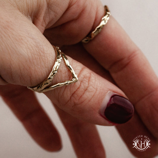 Infinity Ring in brass with small assorted stones, Axial Forms handmade wax-carved ring, on hand