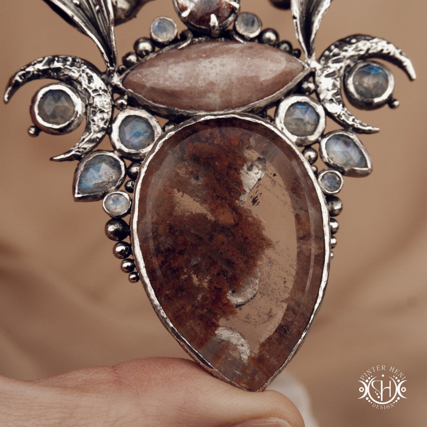 ishtar’s-oasis-silver-statement pendant-with-crystals

Sculptural silver pendant with crystal and gemstone composition, ceremonial inspired statement necklace, Ishtar’s Oasis.