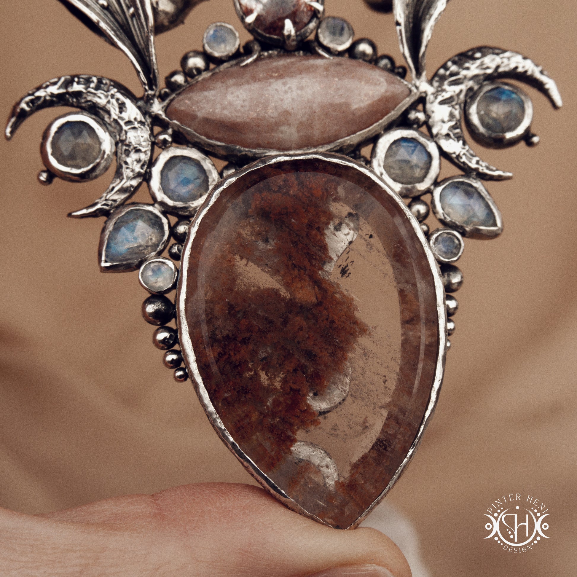 ishtar’s-oasis-silver-statement pendant-with-crystals

Sculptural silver pendant with crystal and gemstone composition, ceremonial inspired statement necklace, Ishtar’s Oasis.