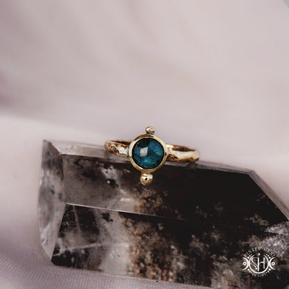 One-of-a-kind brass ring with moss blue kyanite stone from the Skybound Awakening collection.