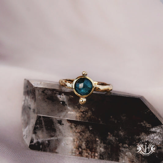 One-of-a-kind brass ring with moss blue kyanite stone from the Skybound Awakening collection.
