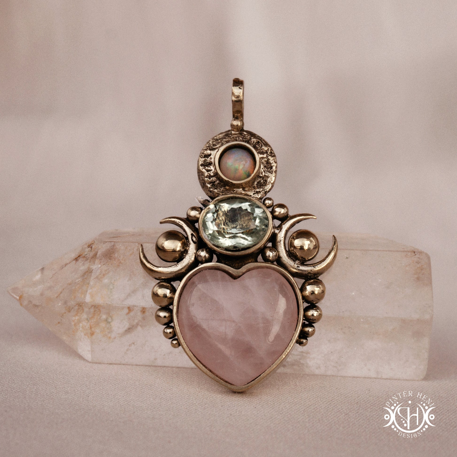 Hand-carved Aphrodite pendant with rose quartz, opal and prasiolite.