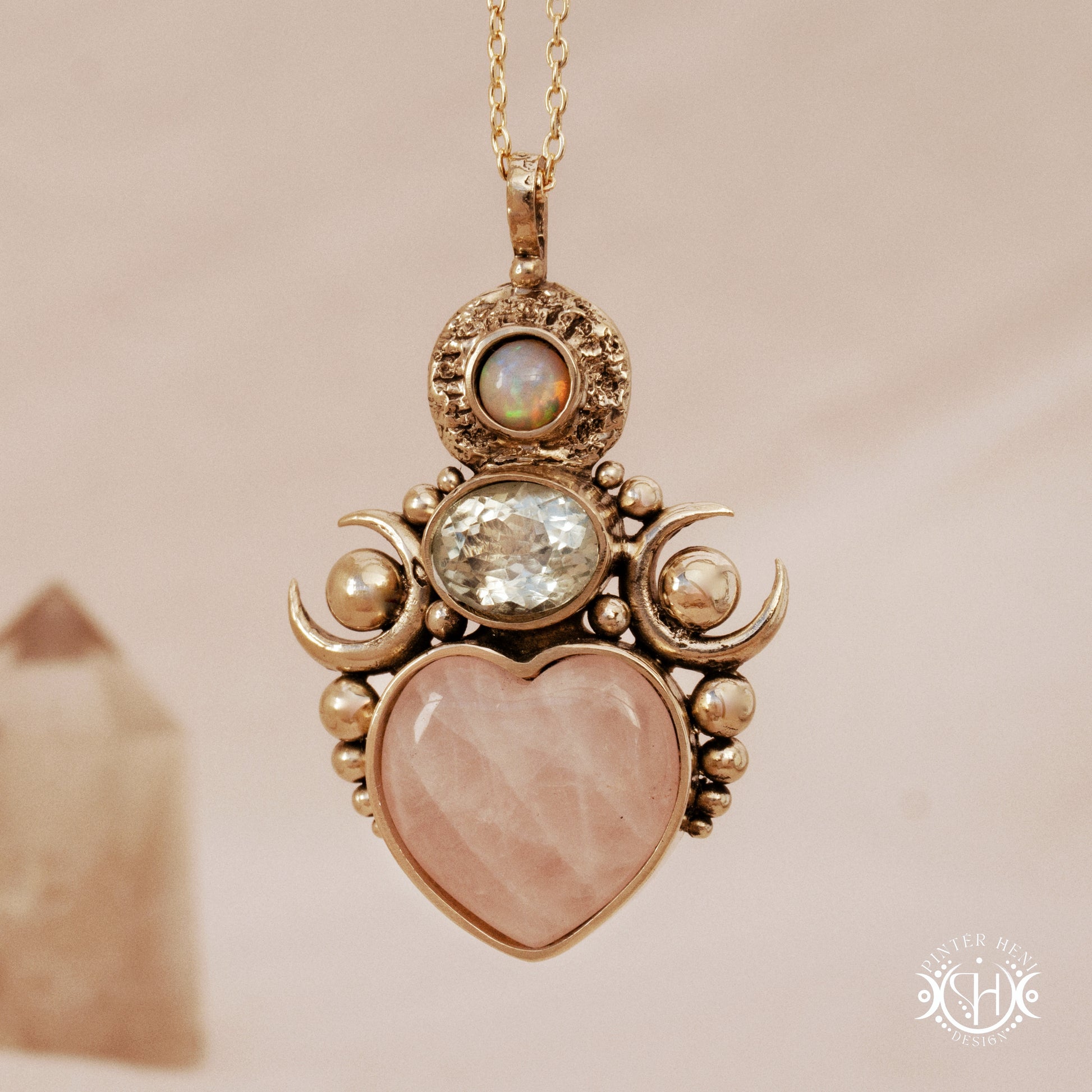 Hand-carved Aphrodite pendant with rose quartz, opal and prasiolite.