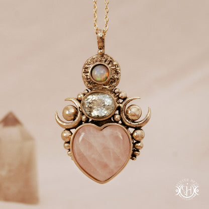 Hand-carved Aphrodite pendant with rose quartz, opal and prasiolite.