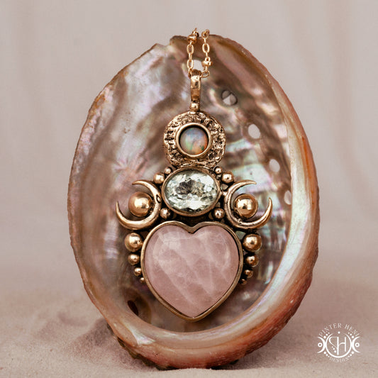 Hand-carved Aphrodite pendant with rose quartz, opal and prasiolite.
