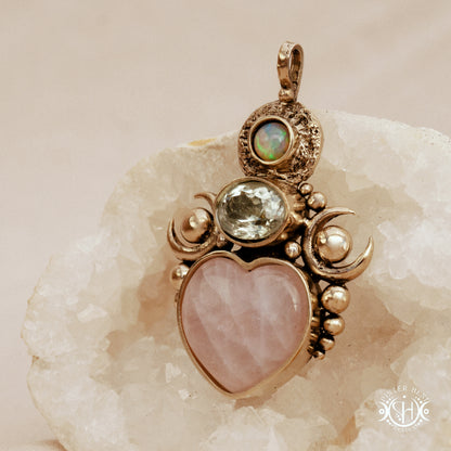 Hand-carved Aphrodite pendant with rose quartz, opal and prasiolite.