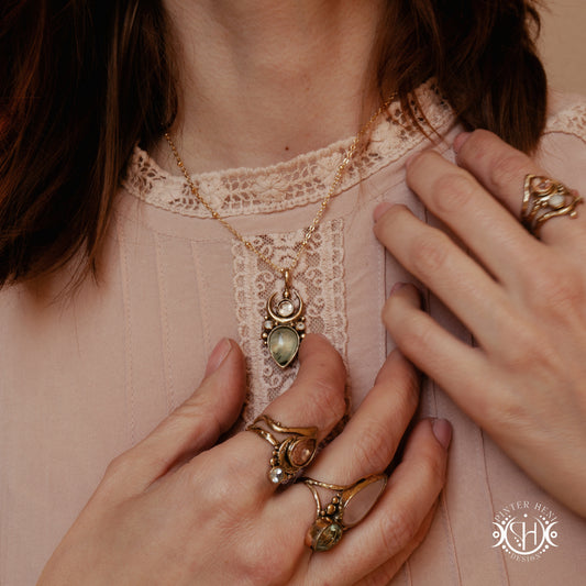 Close-up of a person wearing gold jewelry