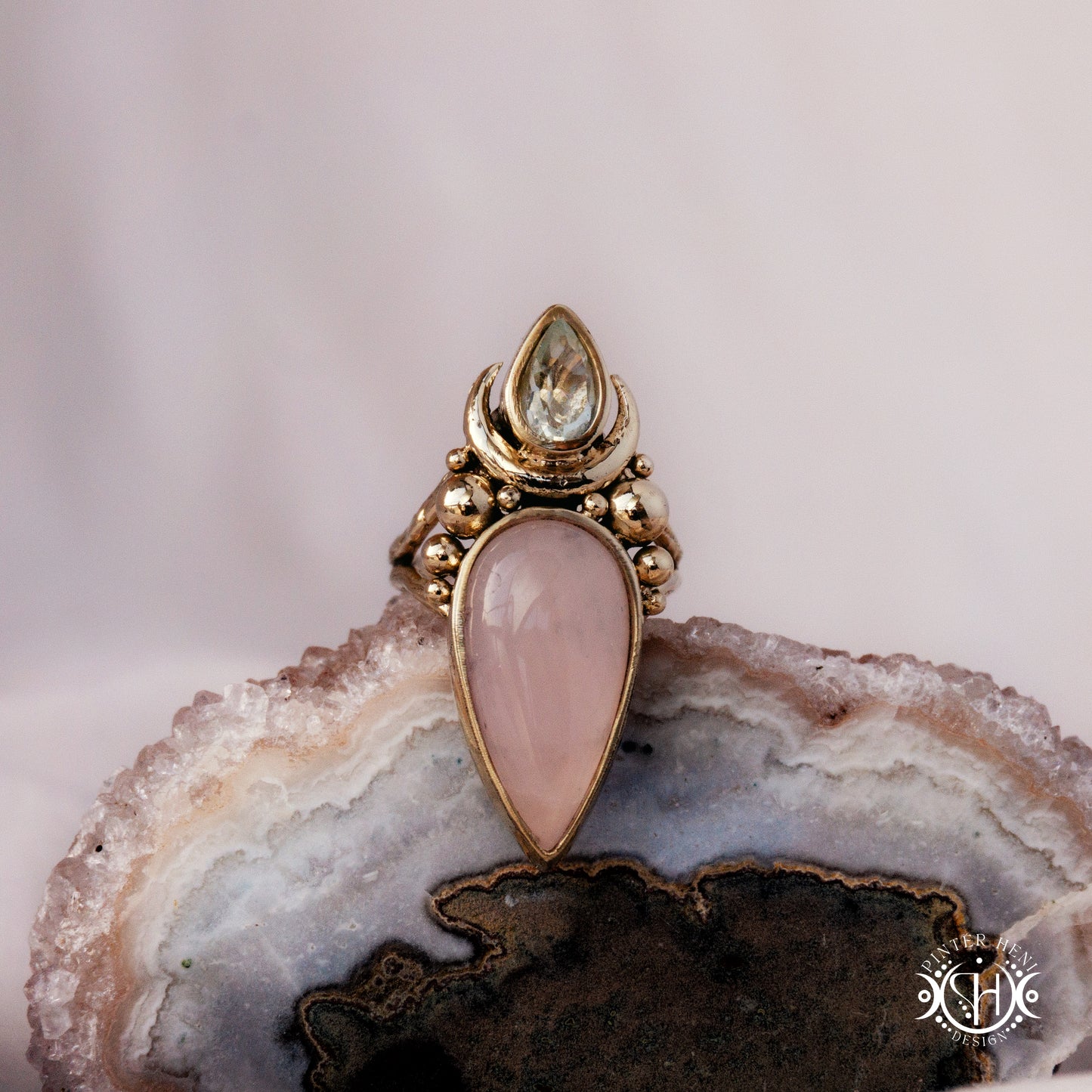 Handmade Artemis ring with prasiolite and rose quartz, on crystal.