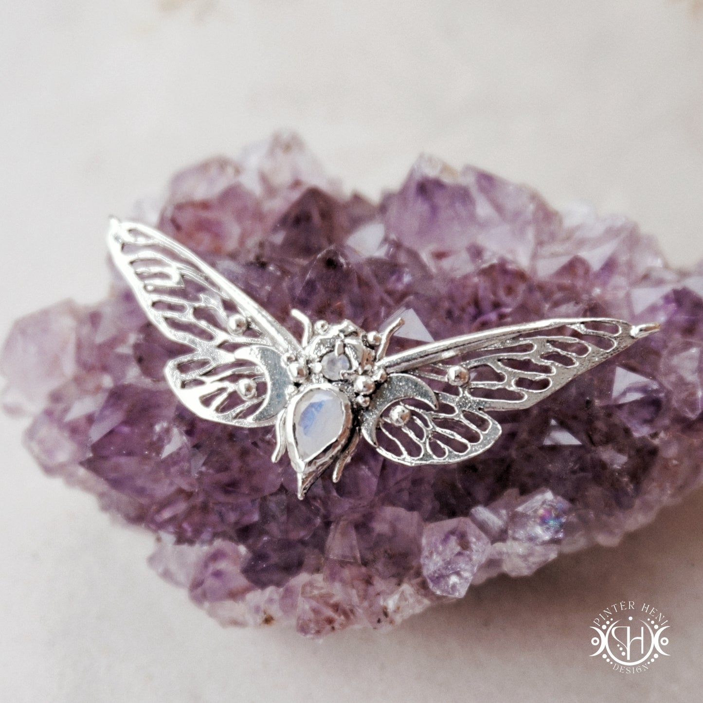 Handcrafted cicada pendant with moonstone in sterling silver.