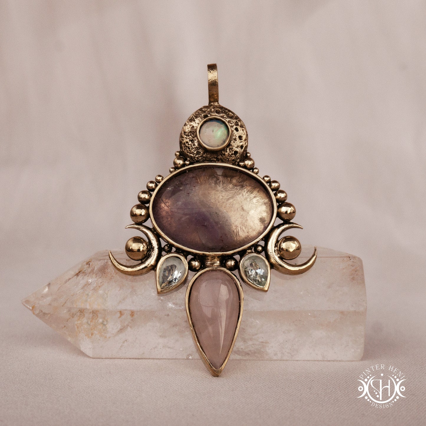 Hand-carved Demeter pendant with rose quartz, amethyst and prasiolite.