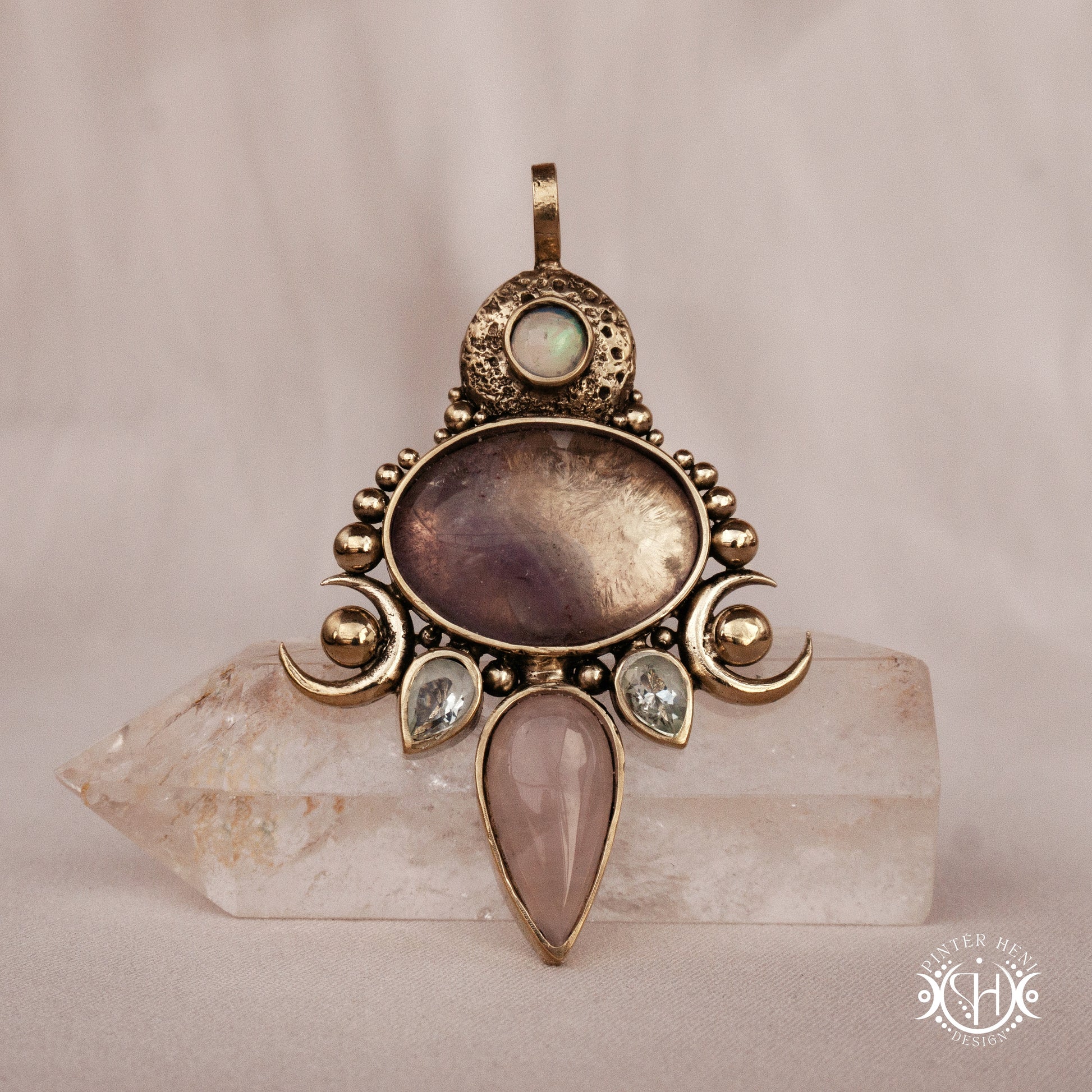 Hand-carved Demeter pendant with rose quartz, amethyst and prasiolite.