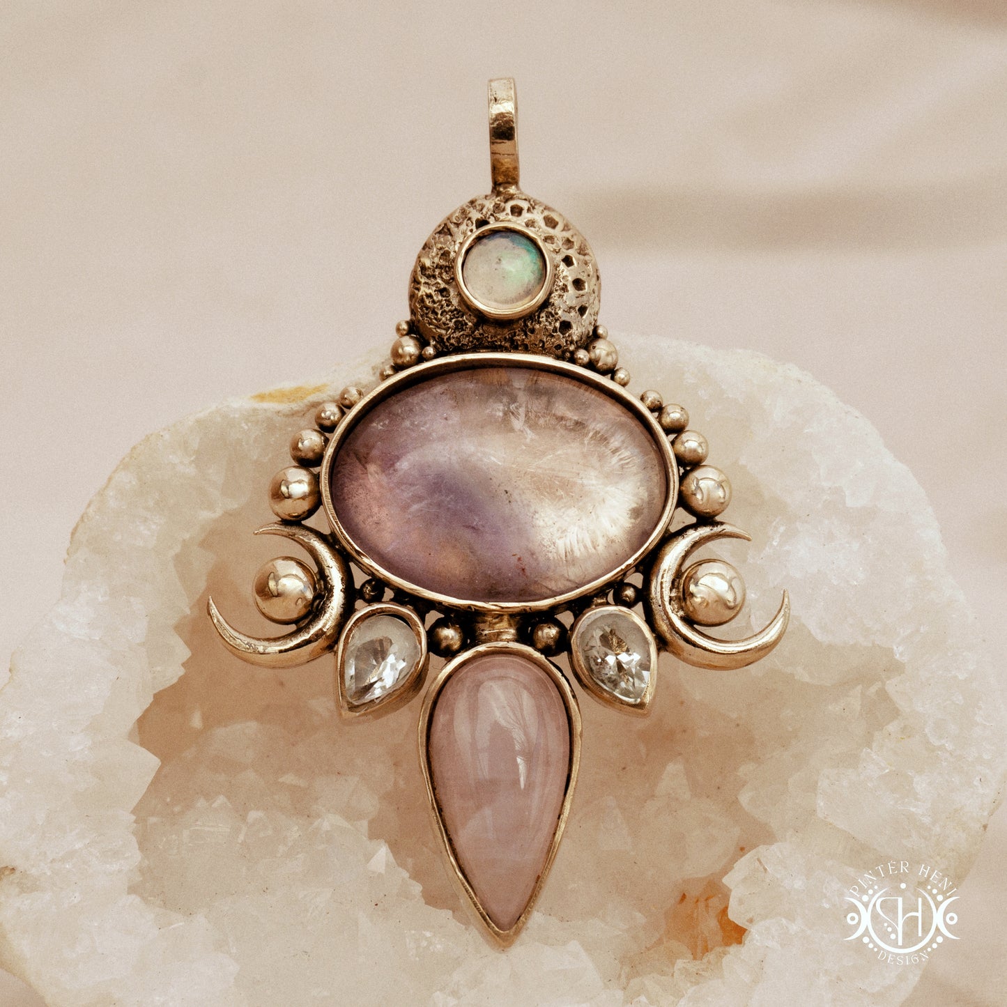 Hand-carved Demeter pendant with rose quartz, amethyst and prasiolite.