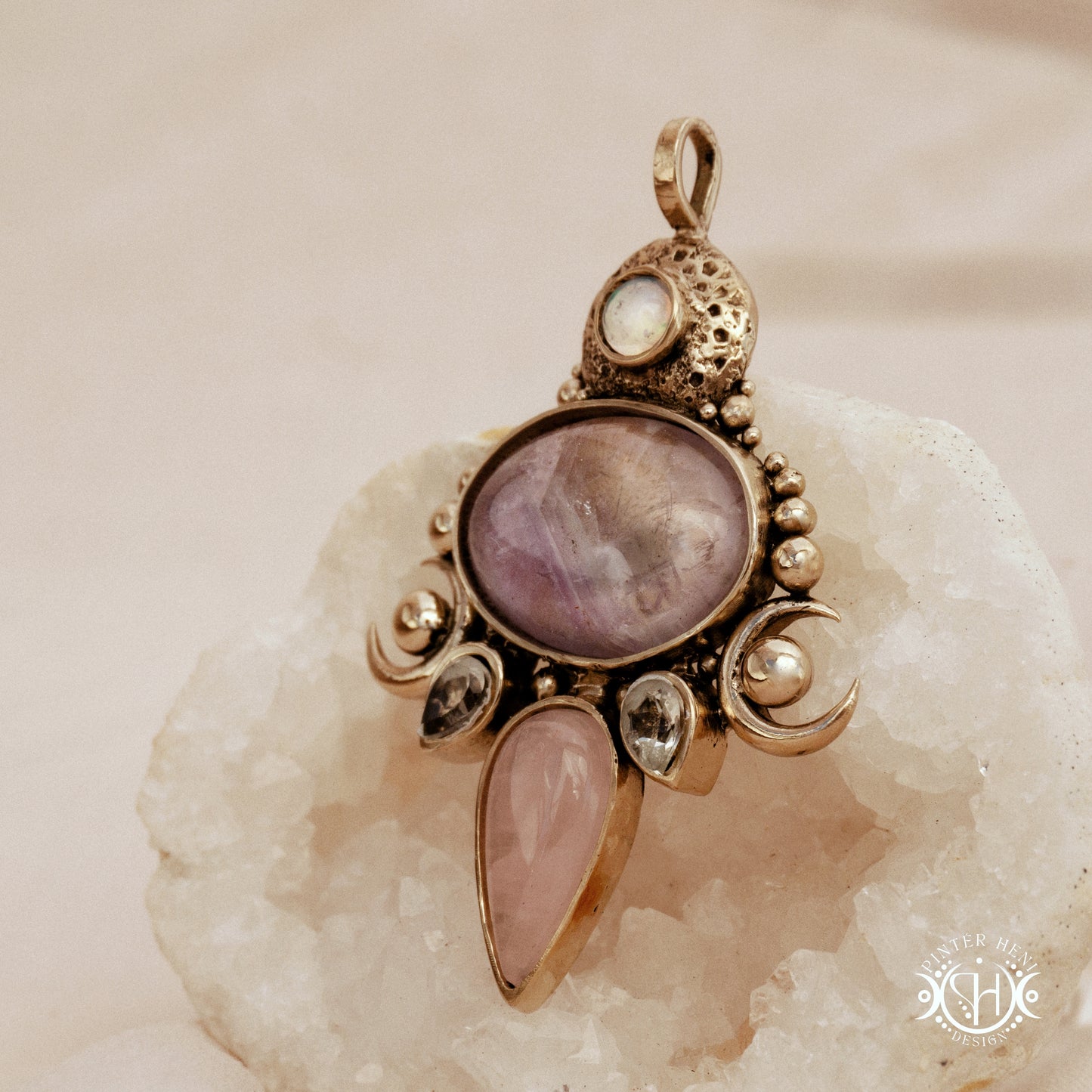 Hand-carved Demeter pendant with rose quartz, amethyst and prasiolite.