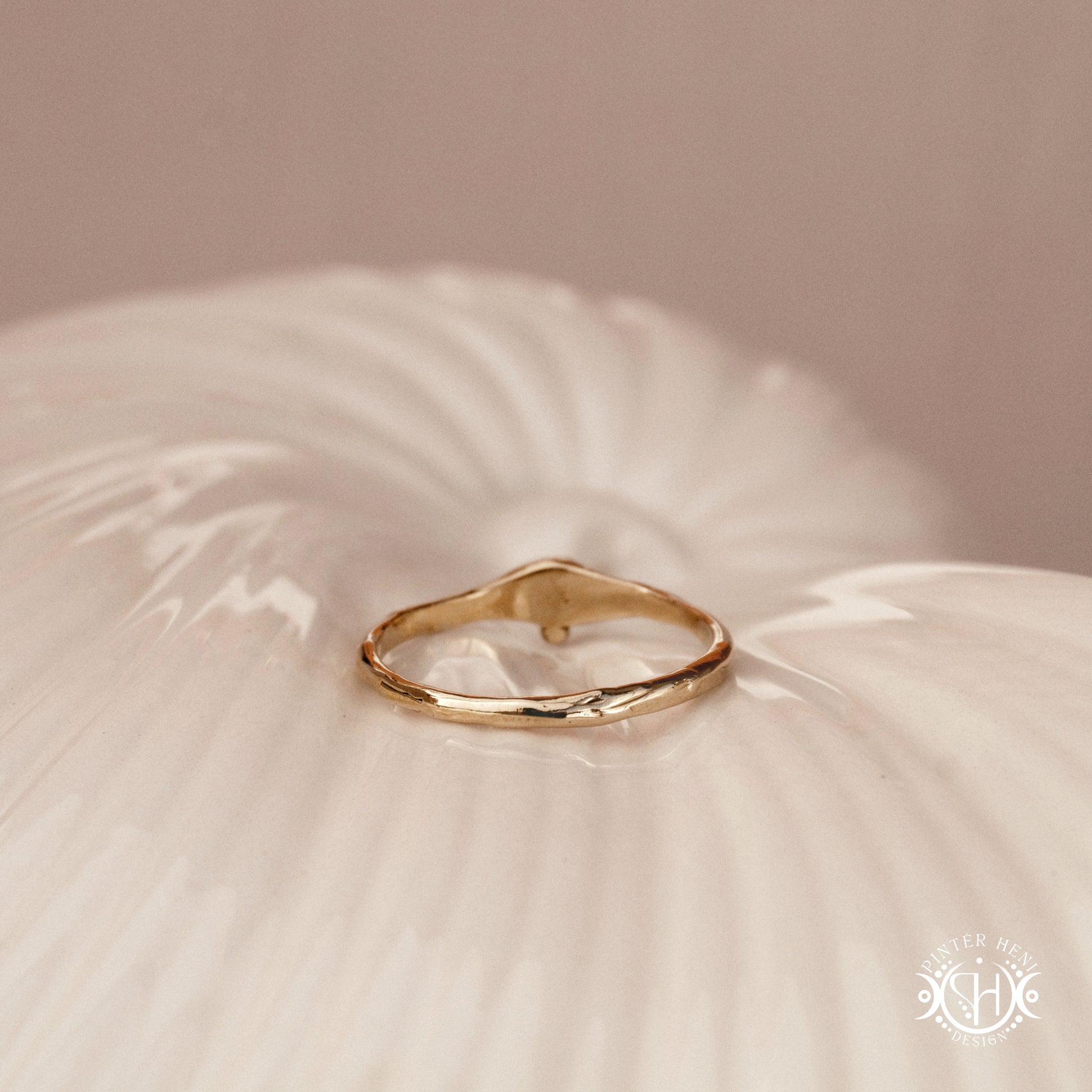 Drift Ring – a softly curved Axial Form suggesting gentle orbital movement. Handmade to order in brass, silver, or gold.