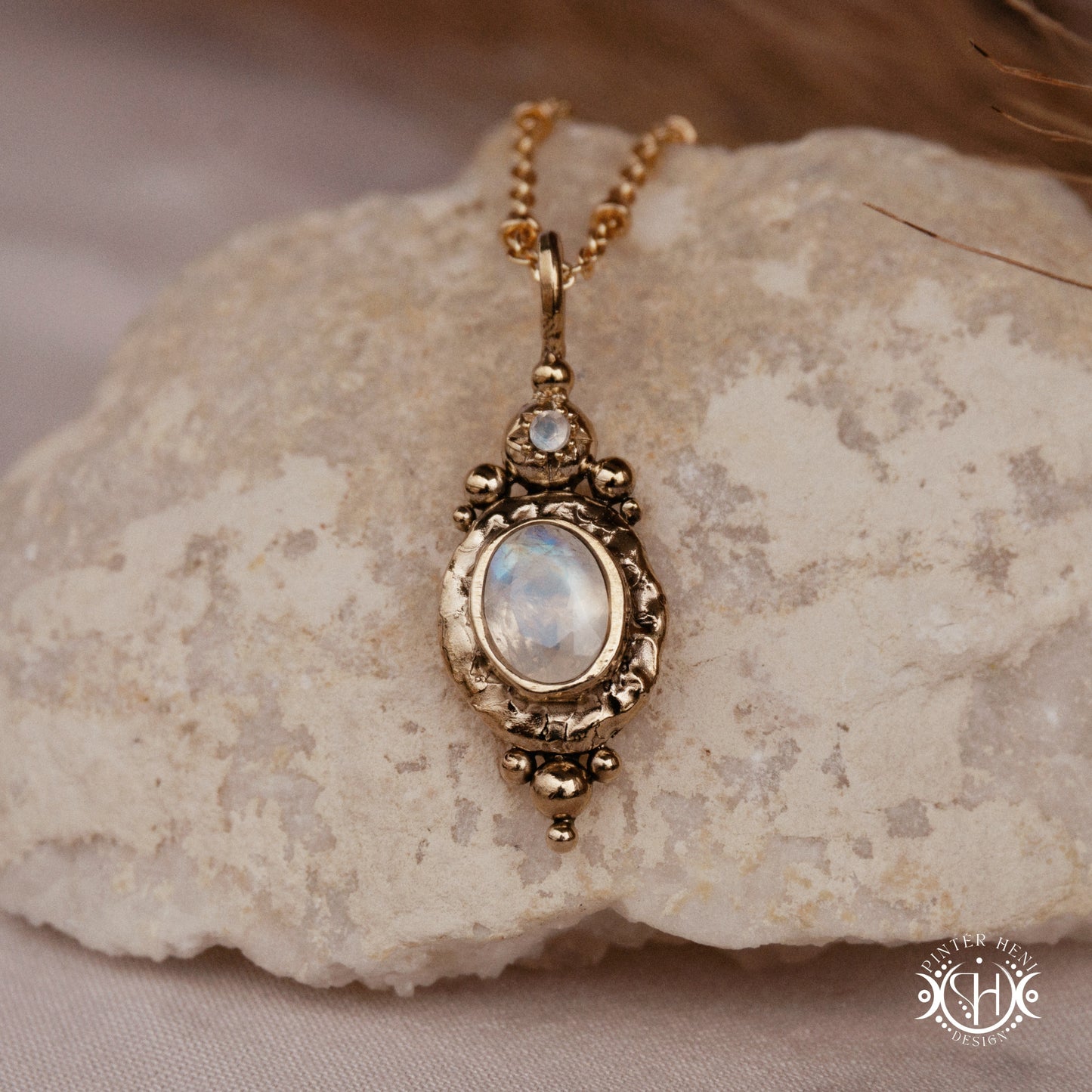 Handmade organic pendant with moonstone and compact ancient-inspired form. Made to order in brass, silver or gold.