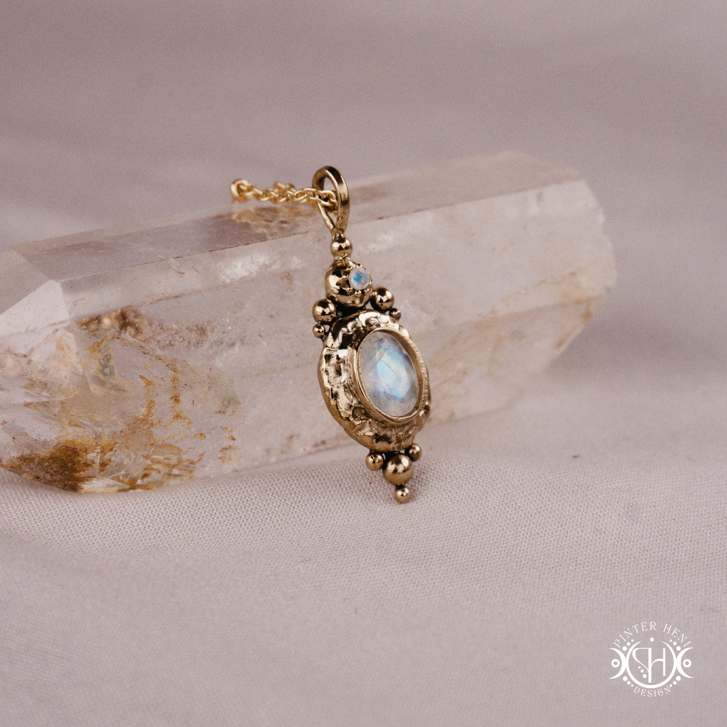 Handmade organic pendant with moonstone and compact ancient-inspired form. Made to order in brass, silver or gold.