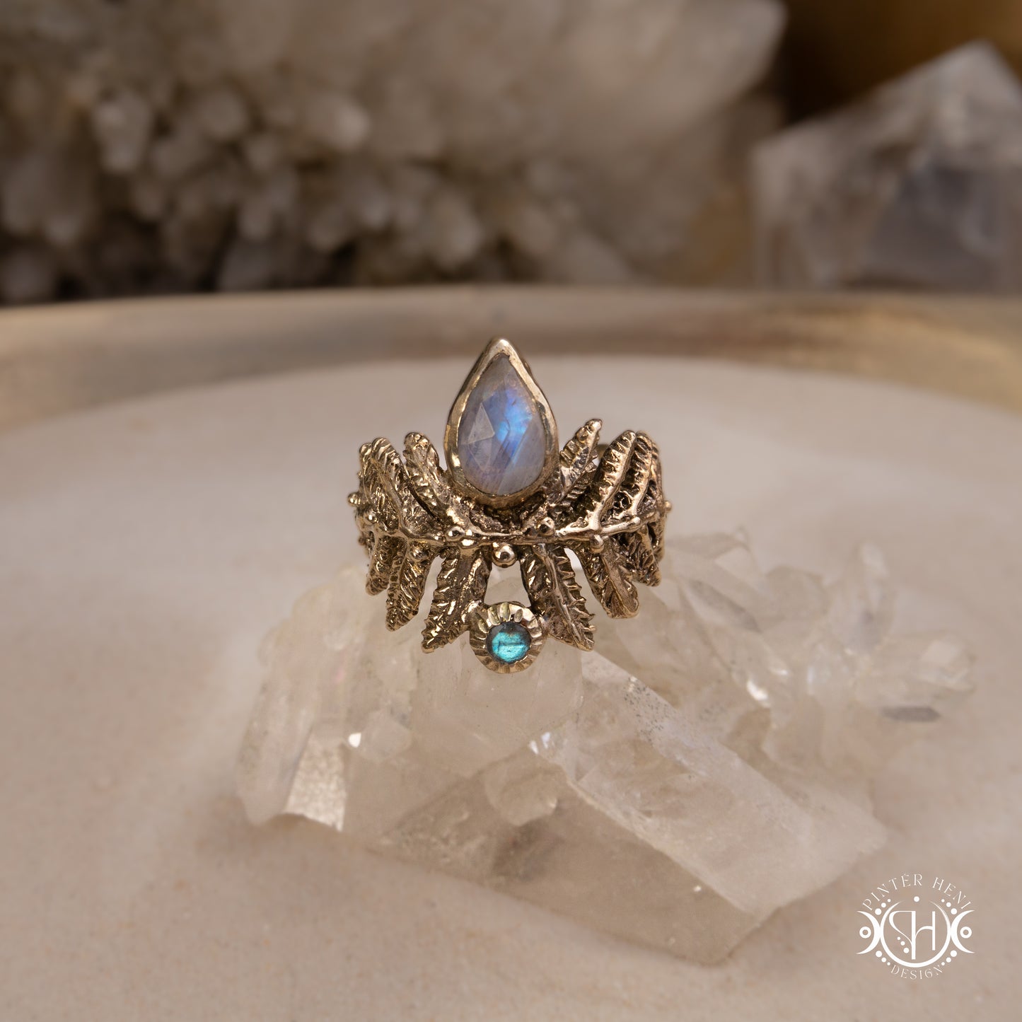 Handcrafted sculptural brass fern ring with labradorite stone.