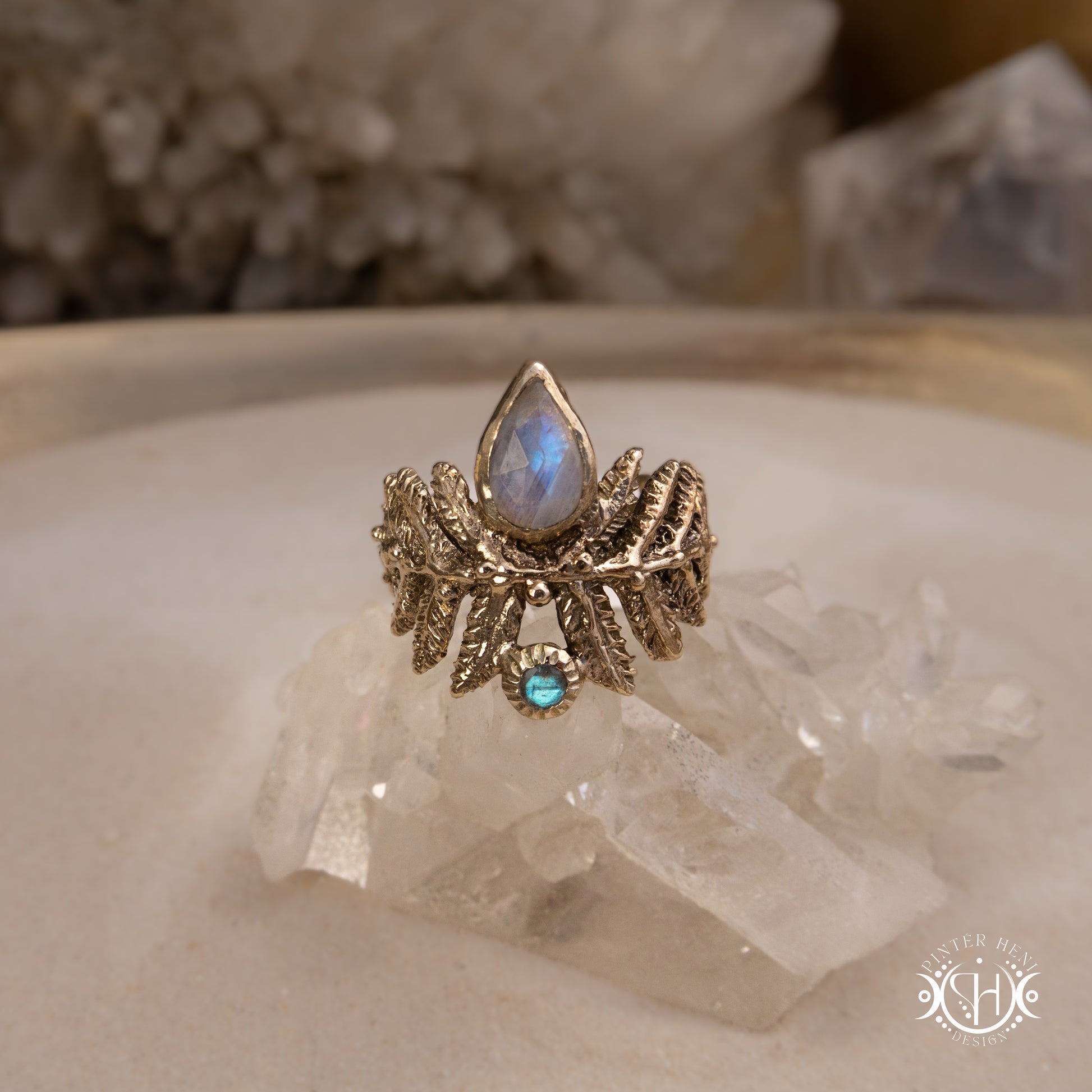 Handcrafted sculptural brass fern ring with labradorite stone.