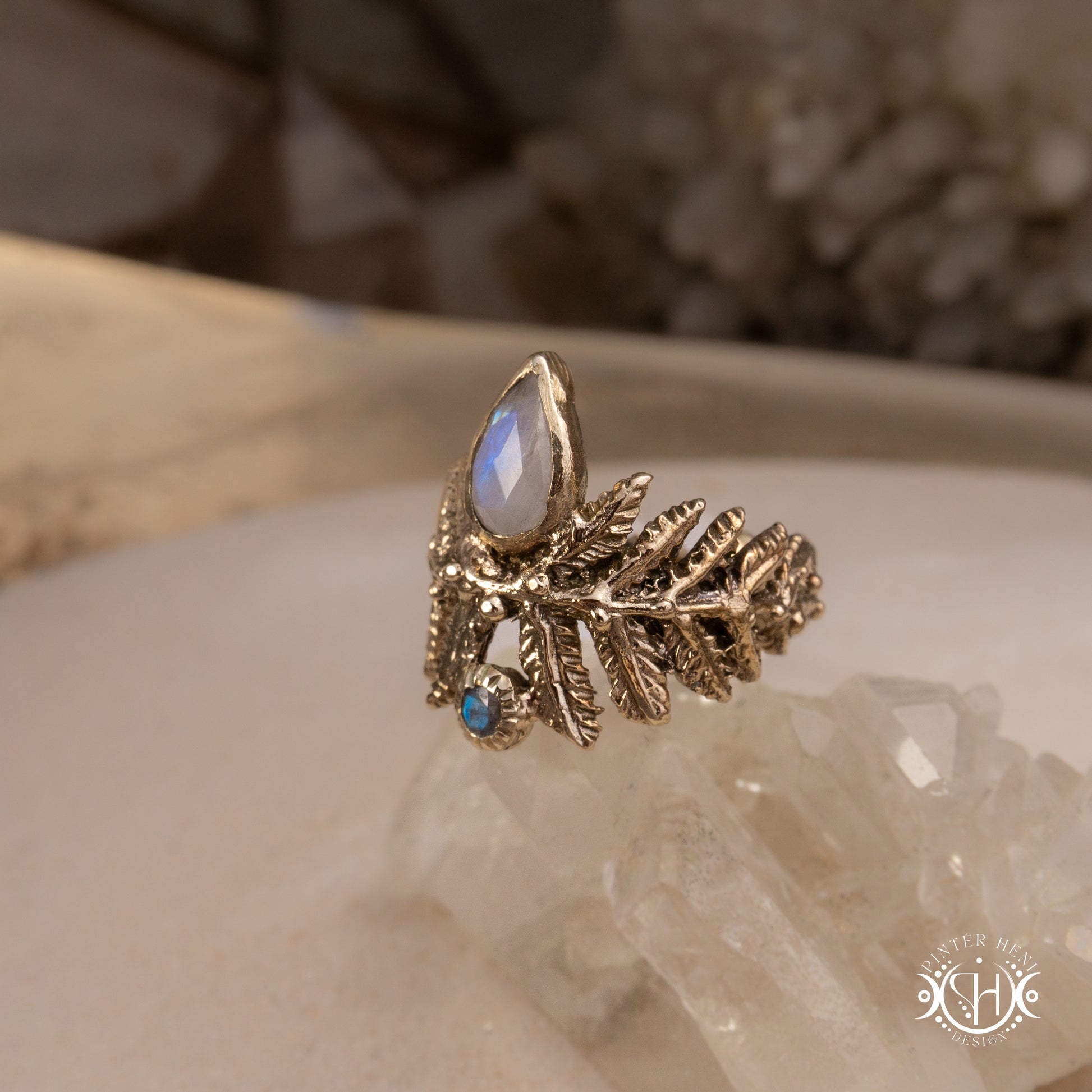 Handcrafted sculptural brass fern ring with labradorite stone.