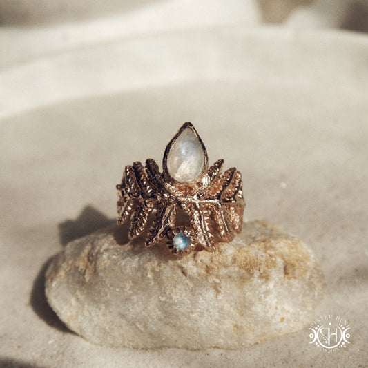 Handcrafted sculptural rose gold fern ring with labradorite stone.