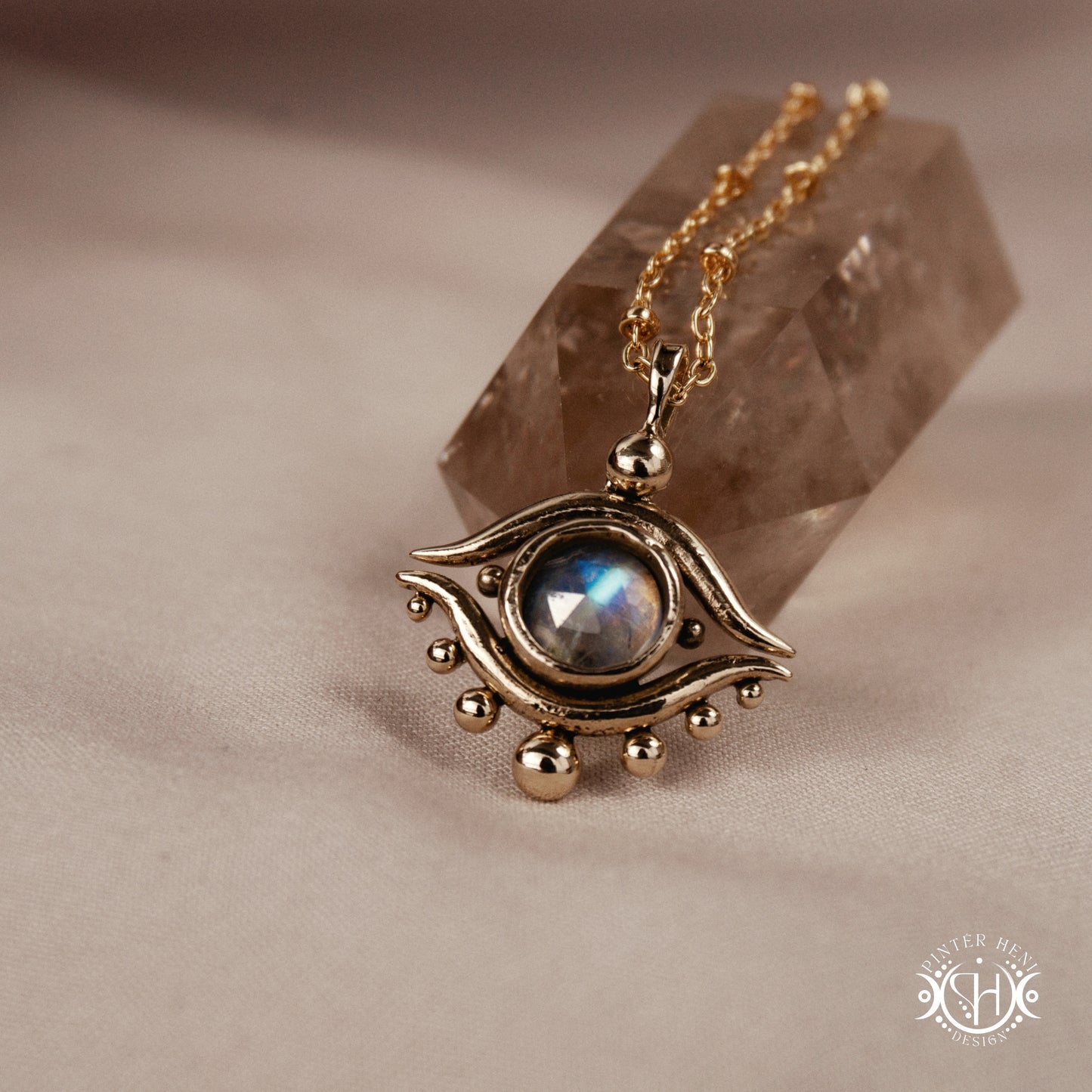 Hand-carved eye pendant in brass from the Primal Symbols collection by Pintér Heni Design