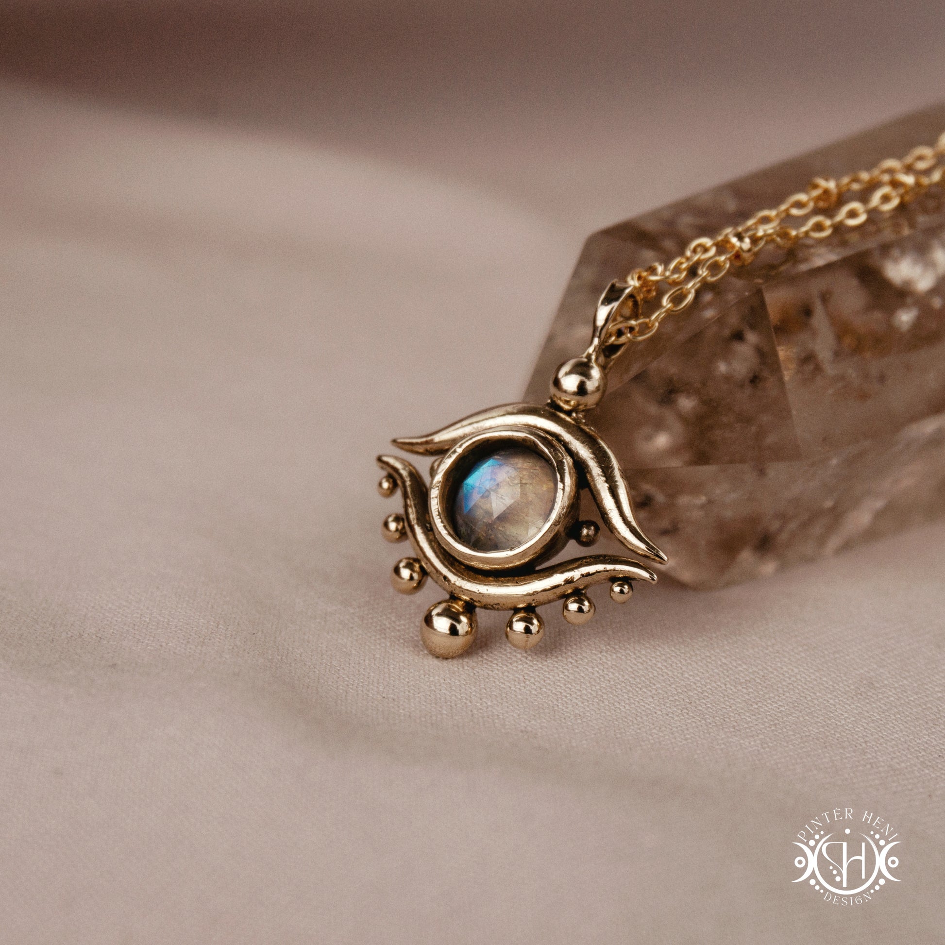 Hand-carved eye pendant in brass from the Primal Symbols collection by Pintér Heni Design