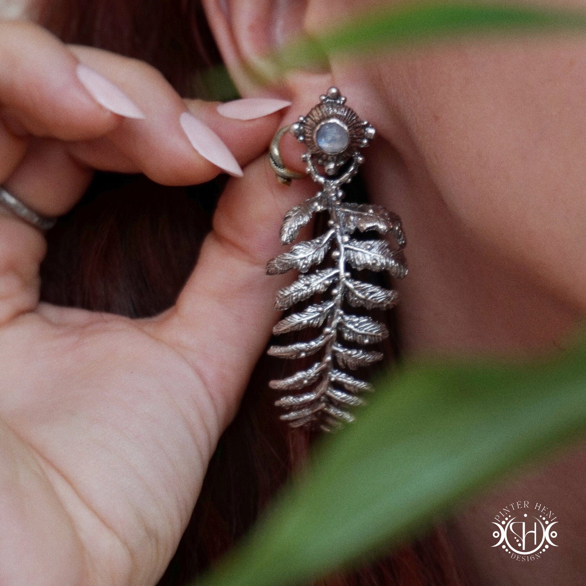 Large handcrafted fern earrings with moonstone.