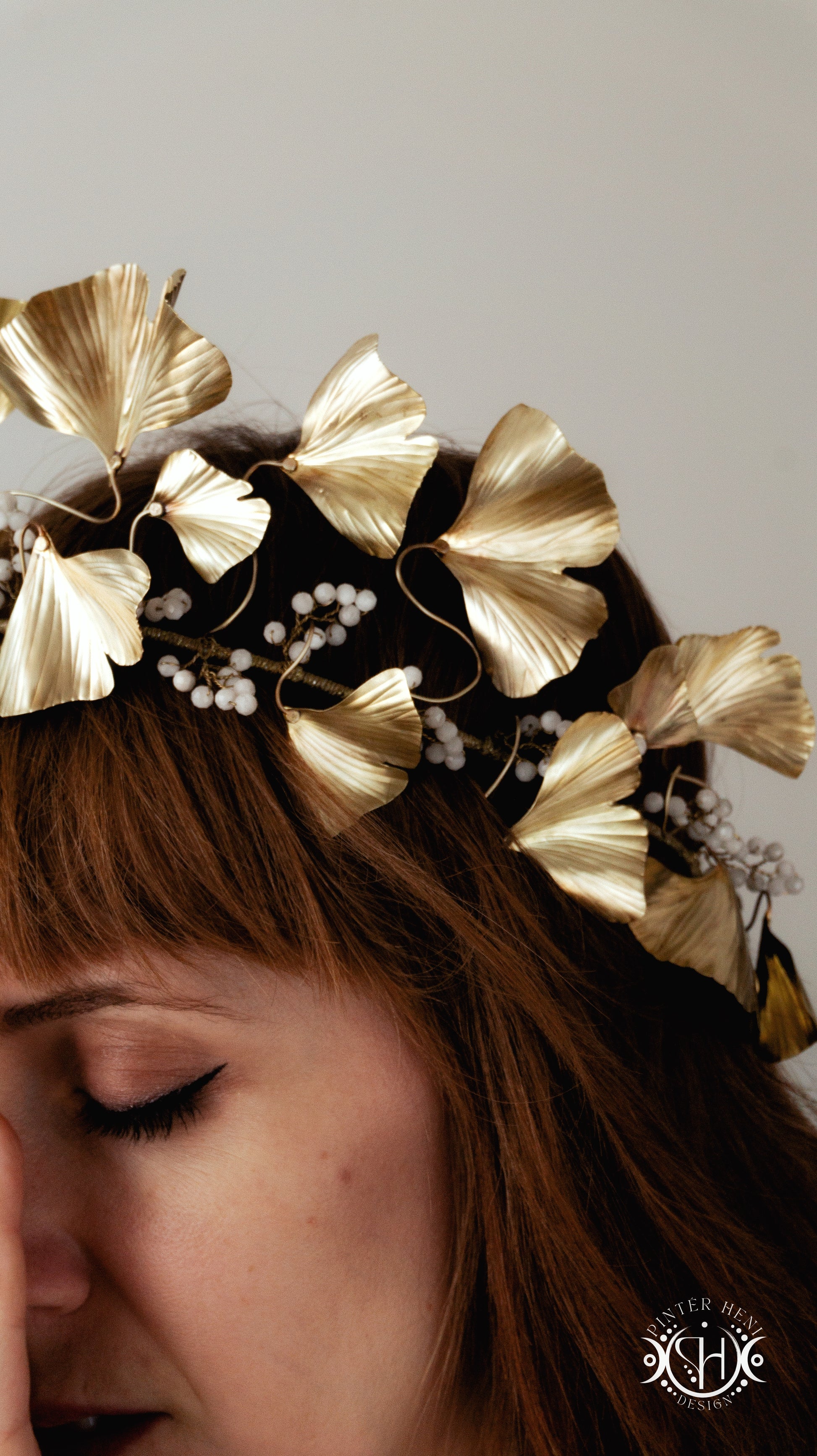 Handmade brass ginkgo leaf bridal crown with moonstones worn on model