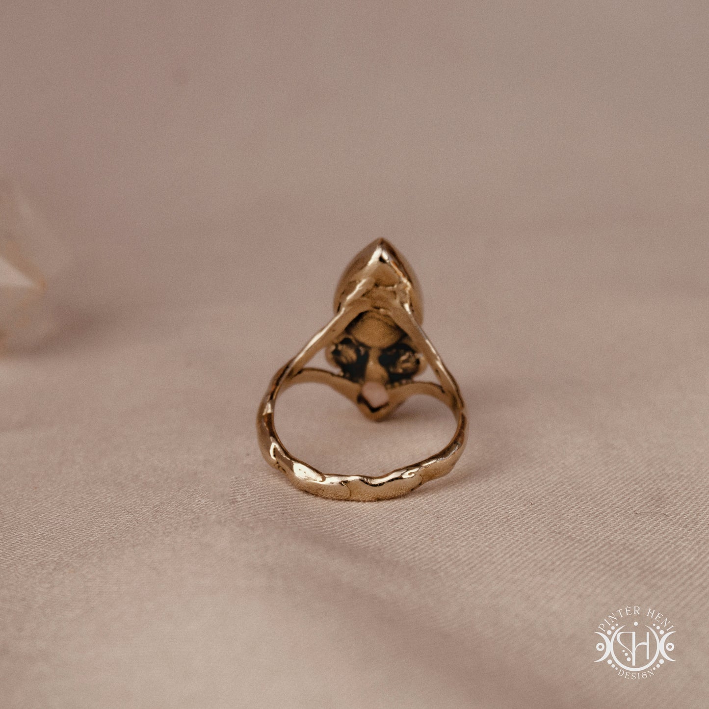 Handmade Harmonia ring with moonstone in symmetrical sculptural setting