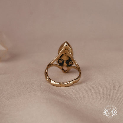 Handmade Harmonia ring with moonstone in symmetrical sculptural setting
