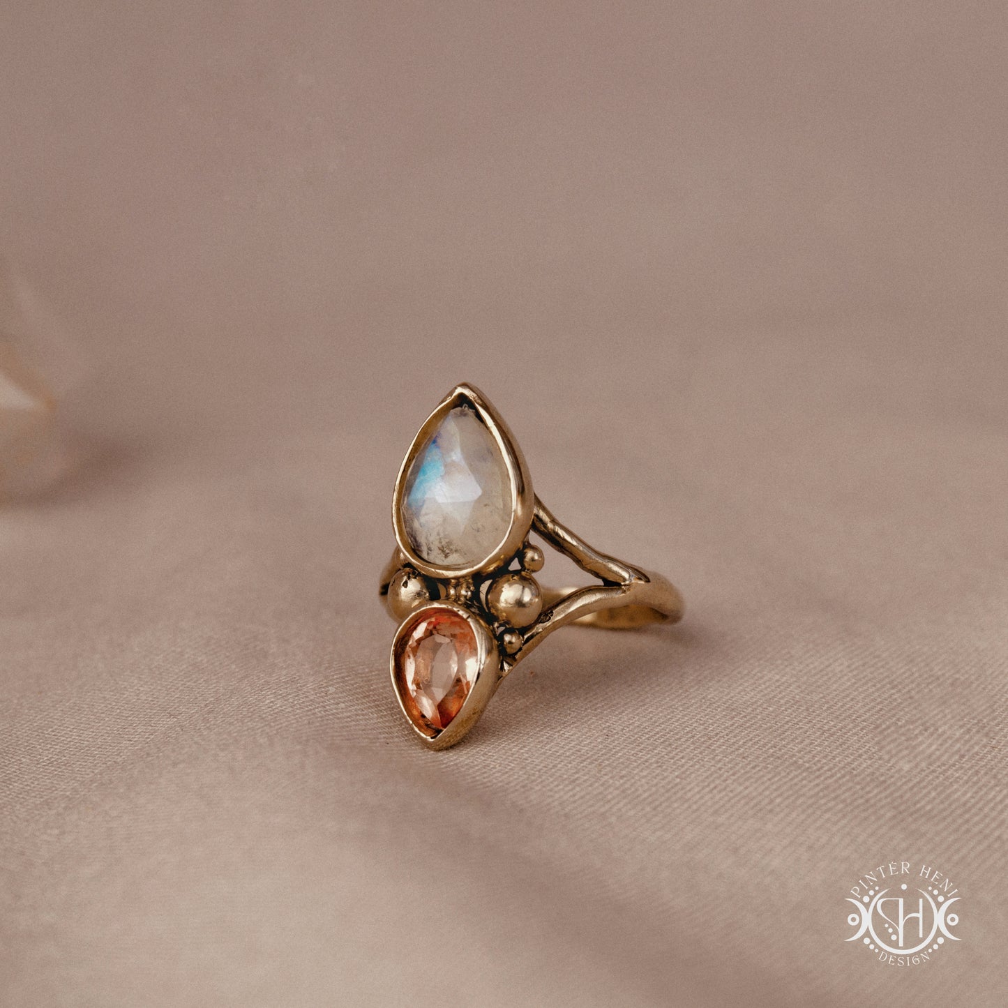Handmade Harmonia ring with moonstone in symmetrical sculptural setting