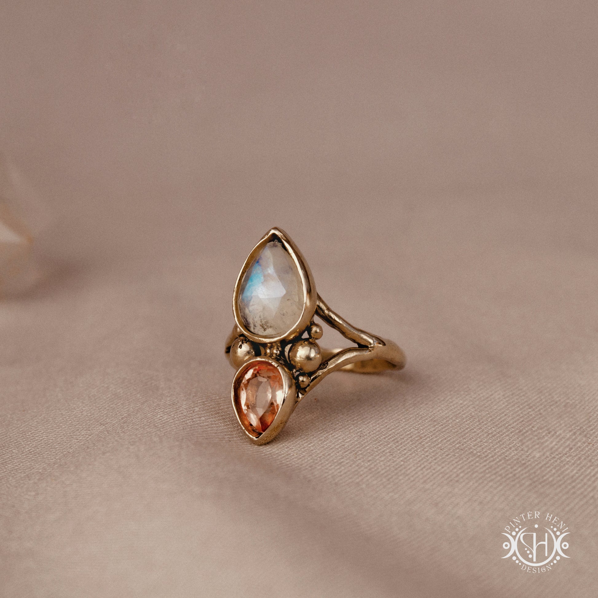 Handmade Harmonia ring with moonstone in symmetrical sculptural setting