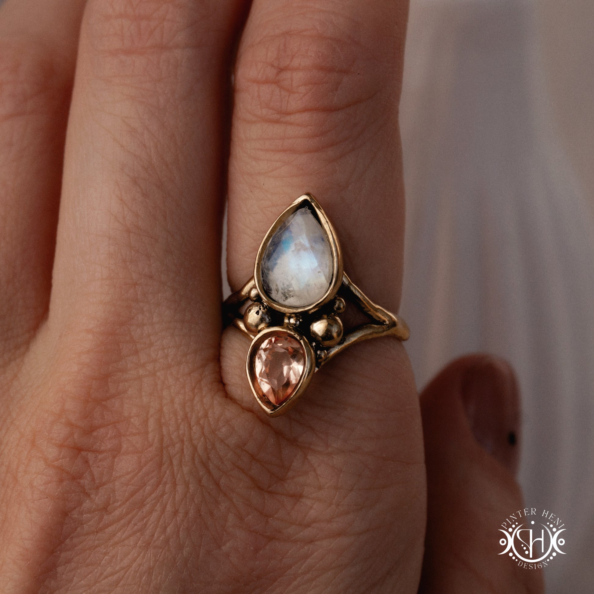 Handmade Harmonia ring with moonstone in symmetrical sculptural setting