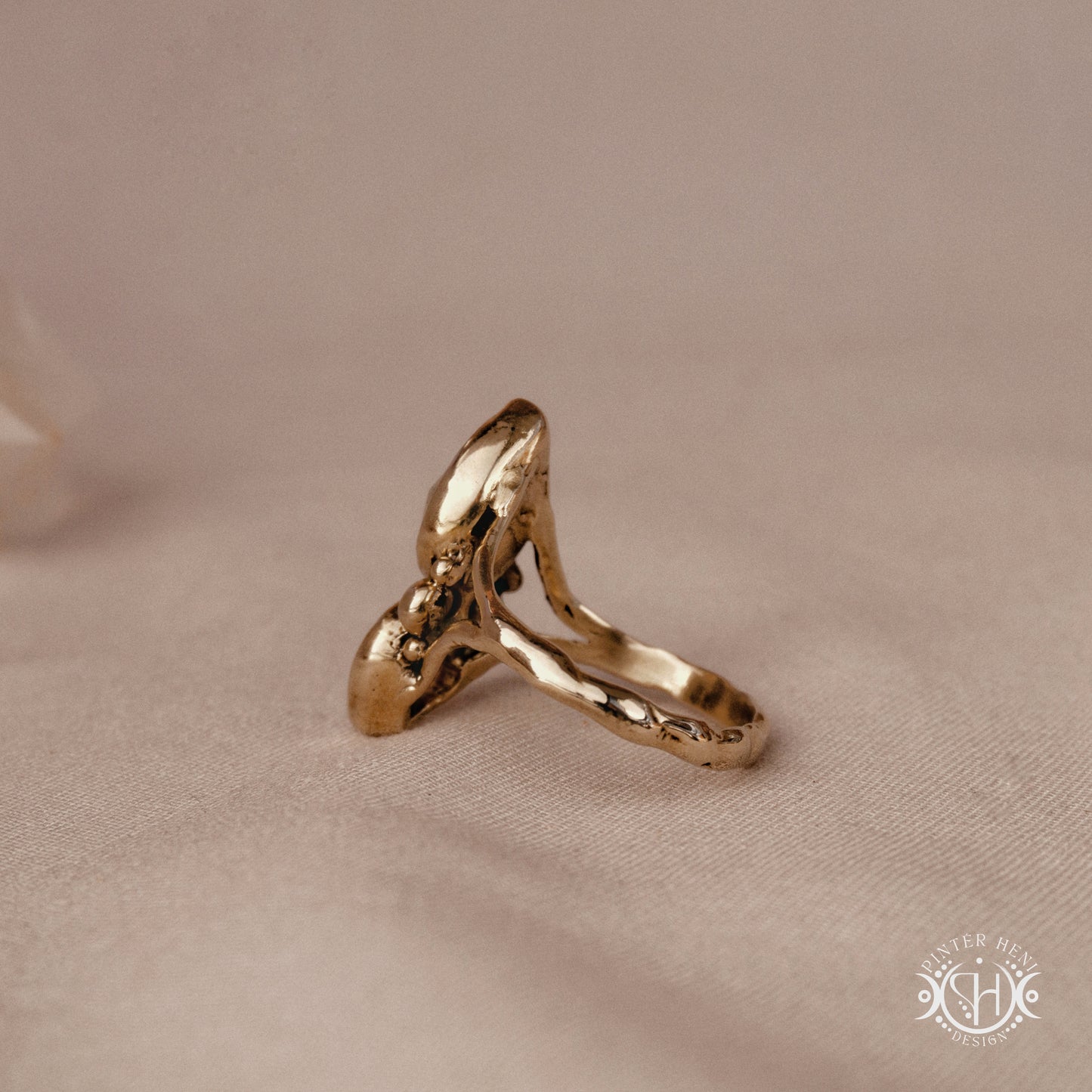 Handmade Harmonia ring with moonstone in symmetrical sculptural setting