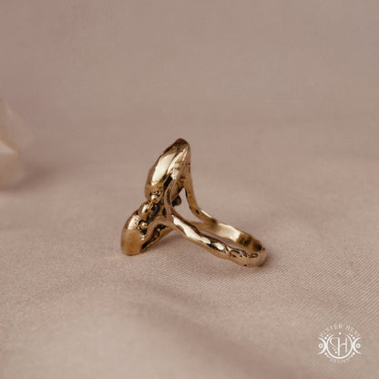 Handmade Harmonia ring with moonstone in symmetrical sculptural setting
