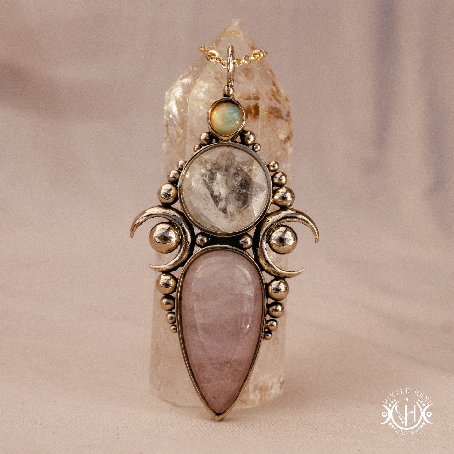 Hand-carved Hecate pendant with rose quartz, rock crystal and opal.