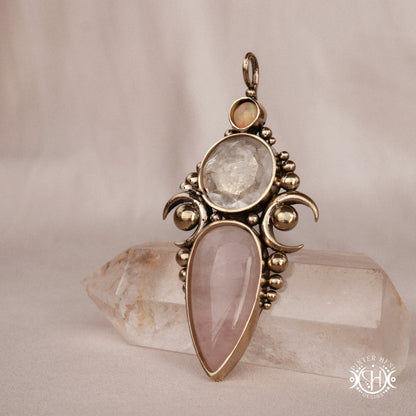 Hand-carved Hecate pendant with rose quartz, rock crystal and opal.