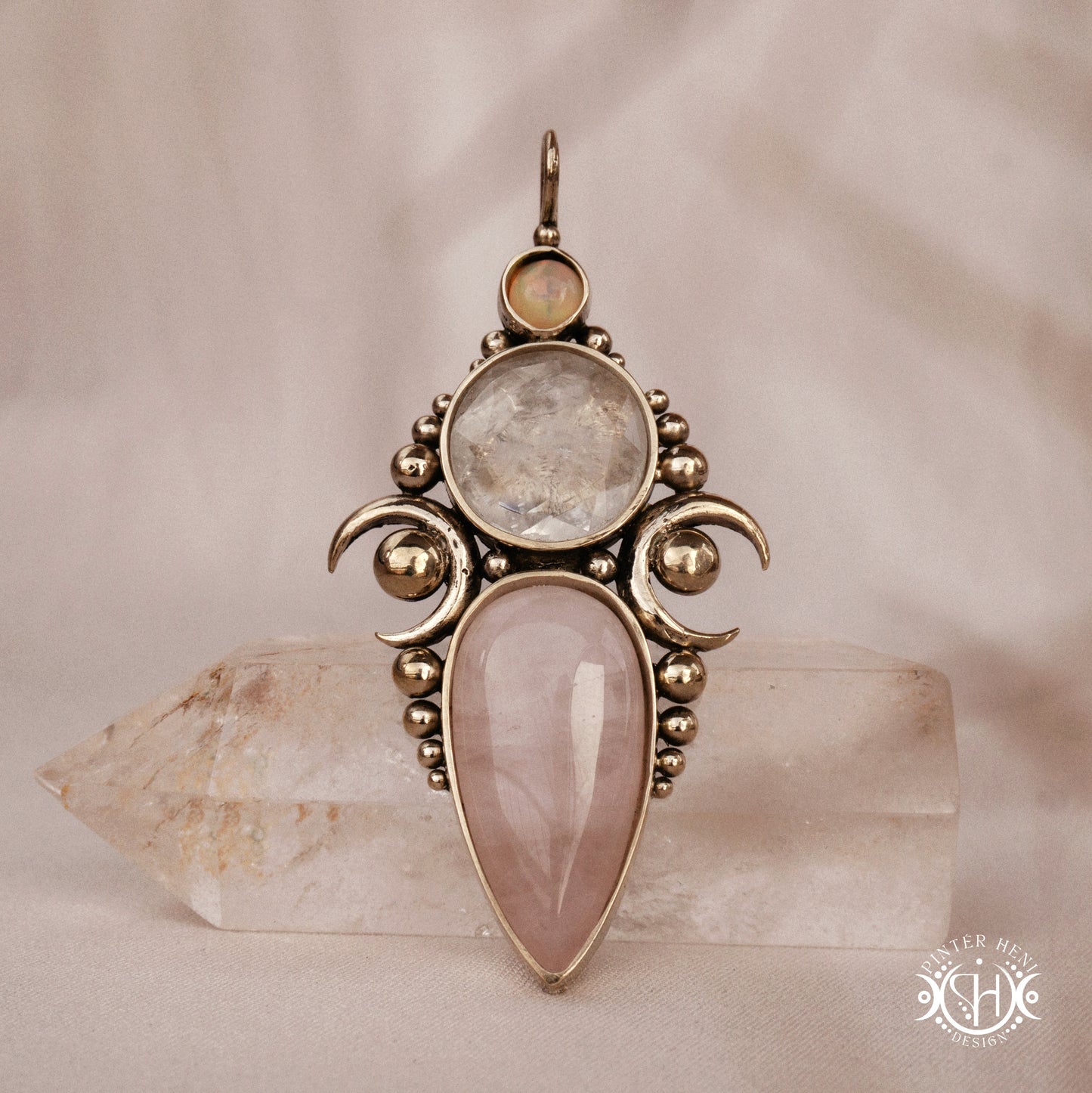 Hand-carved Hecate pendant with rose quartz, rock crystal and opal.
