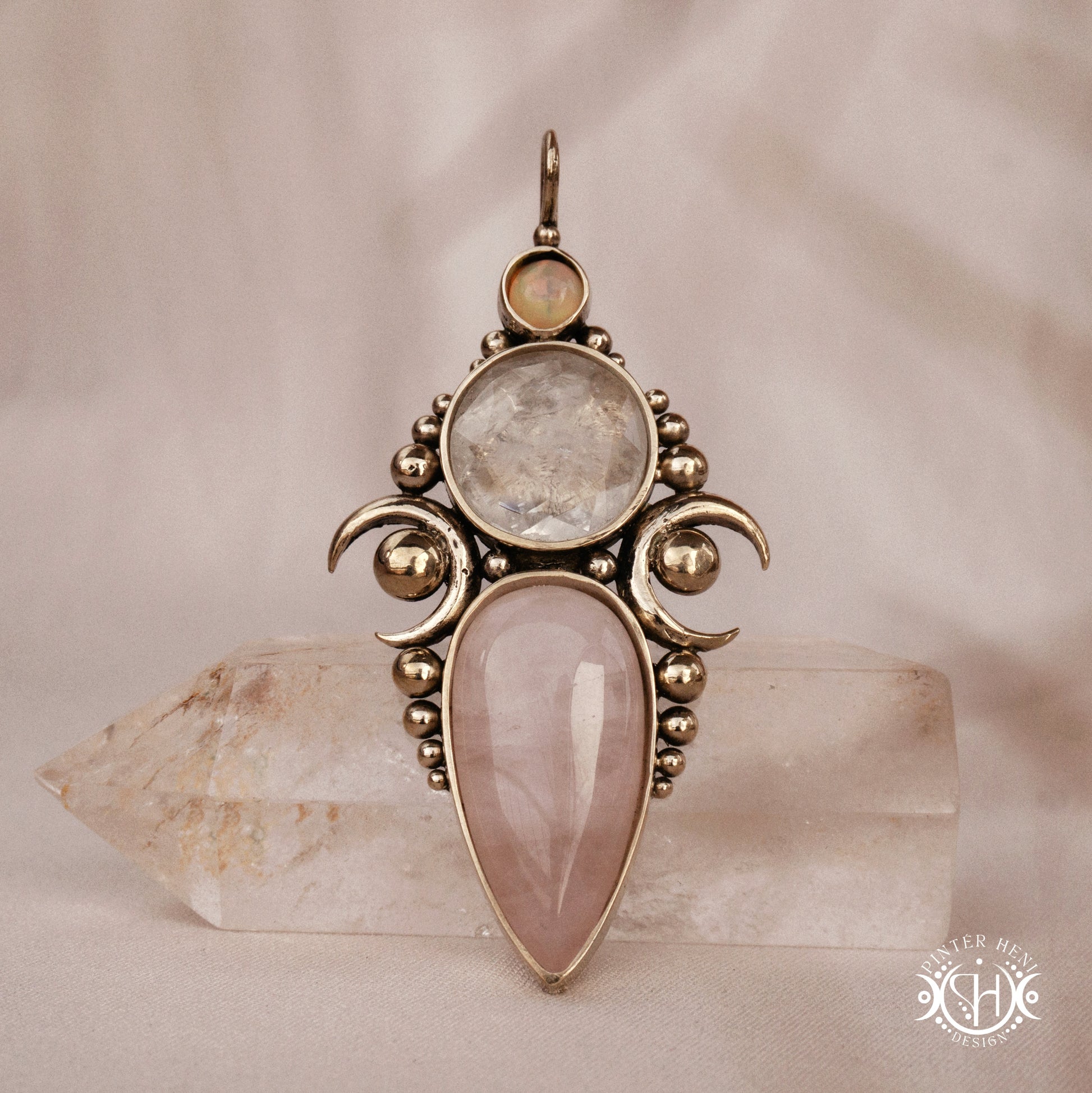 Hand-carved Hecate pendant with rose quartz, rock crystal and opal.