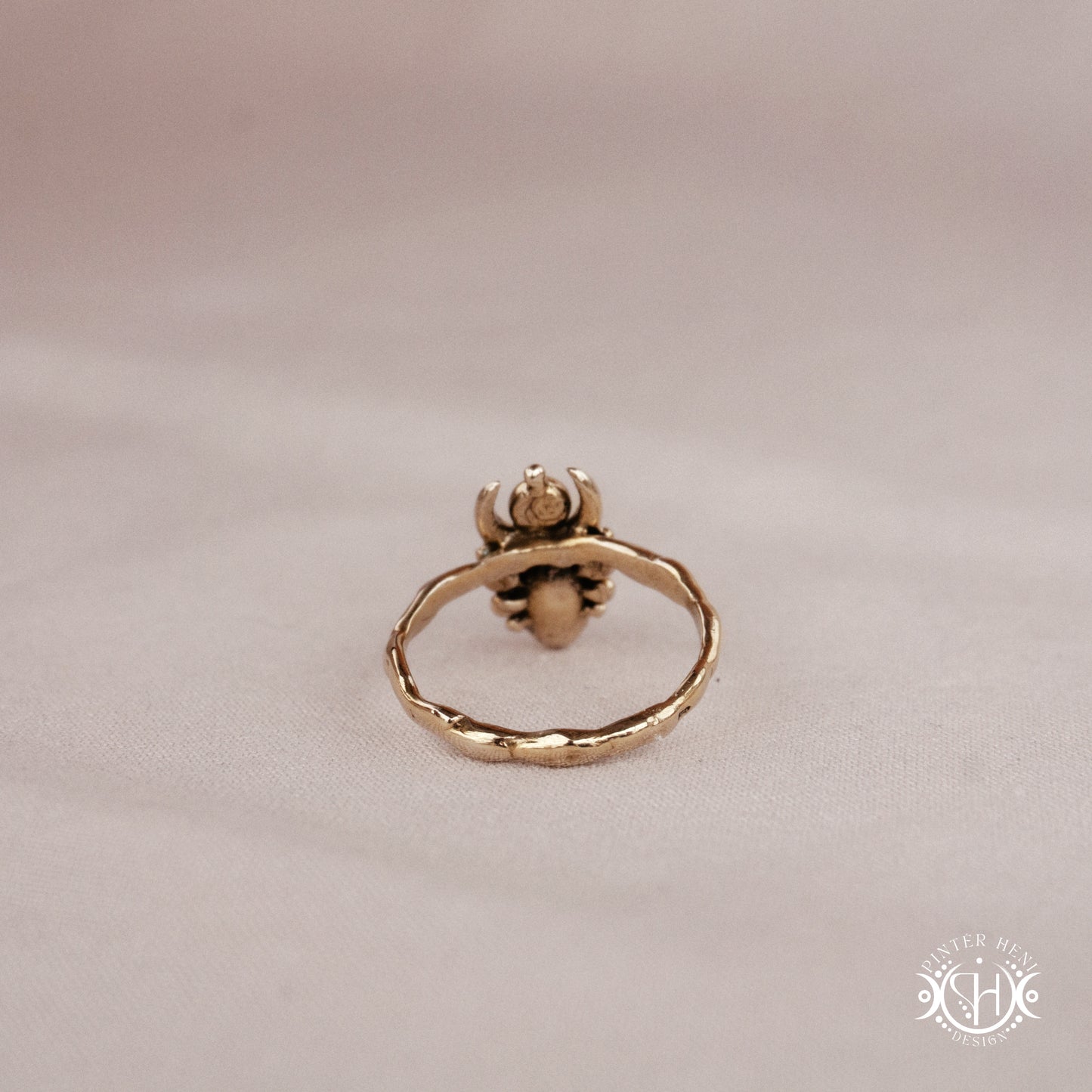 Handmade small scale Hecate ring with aquamarine in sculptural feminine design