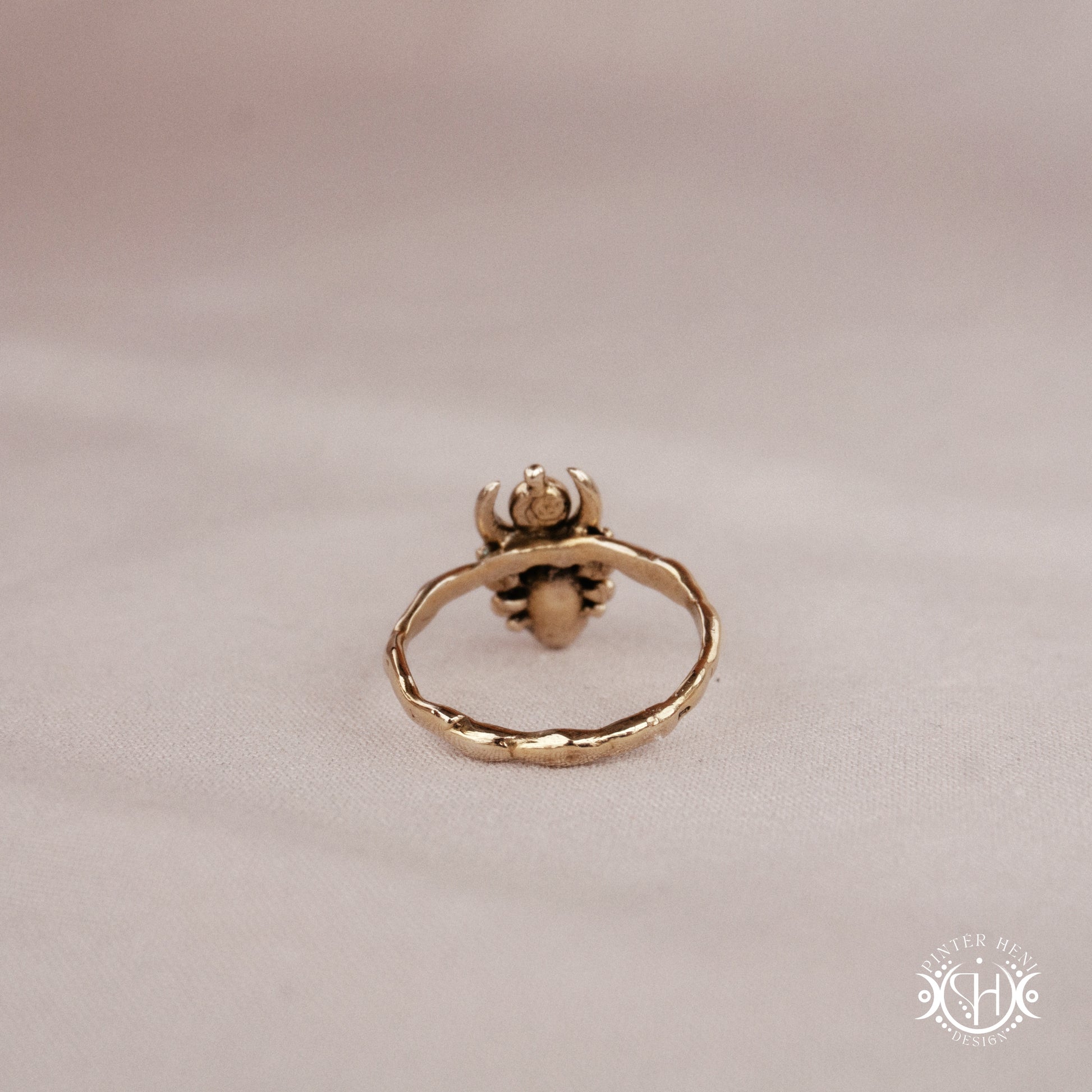 Handmade small scale Hecate ring with aquamarine in sculptural feminine design