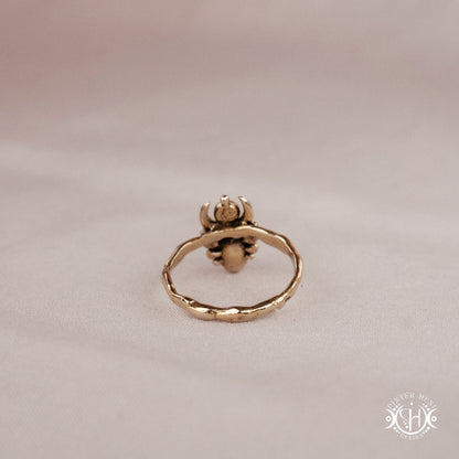 Handmade small scale Hecate ring with aquamarine in sculptural feminine design
