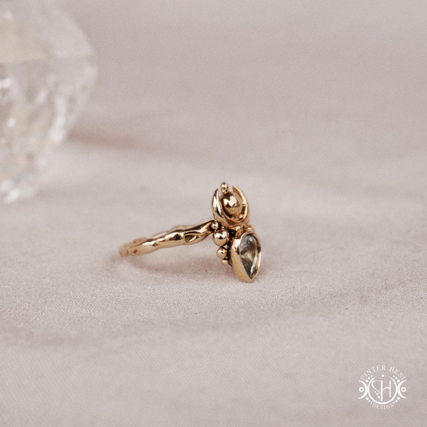 Handmade small scale Hecate ring with aquamarine in sculptural feminine design