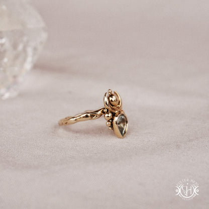 Handmade small scale Hecate ring with aquamarine in sculptural feminine design