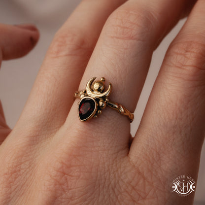 Handmade small scale Hecate ring with aquamarine in sculptural feminine design, on hand.