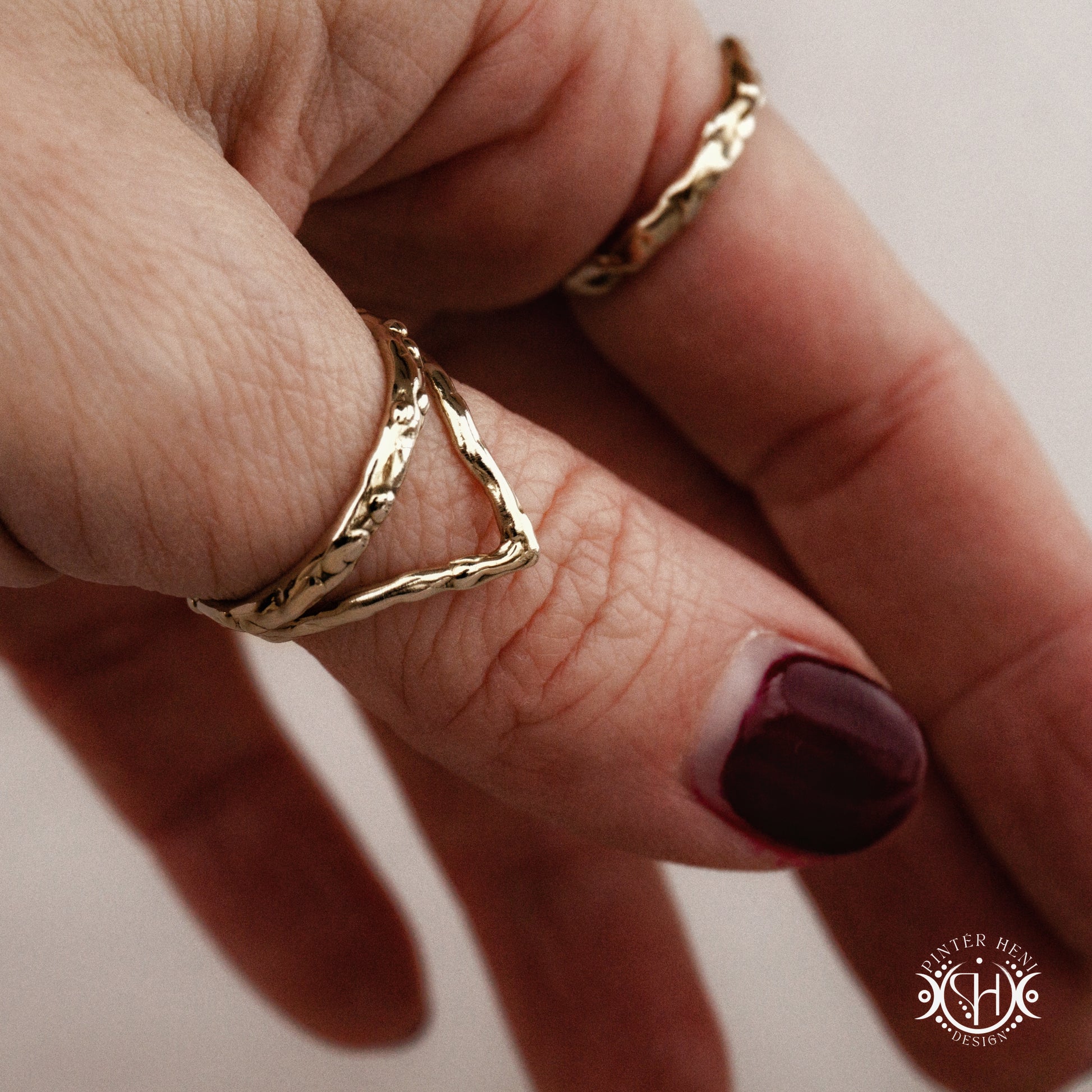 Infinity Ring in brass with small assorted stones, Axial Forms handmade wax-carved ring, on hand