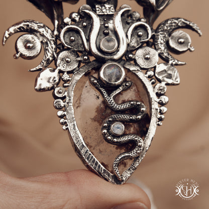 Sculptural silver pendant with crystal and gemstone composition, ceremonial inspired statement necklace, Ishtar’s Oasis.